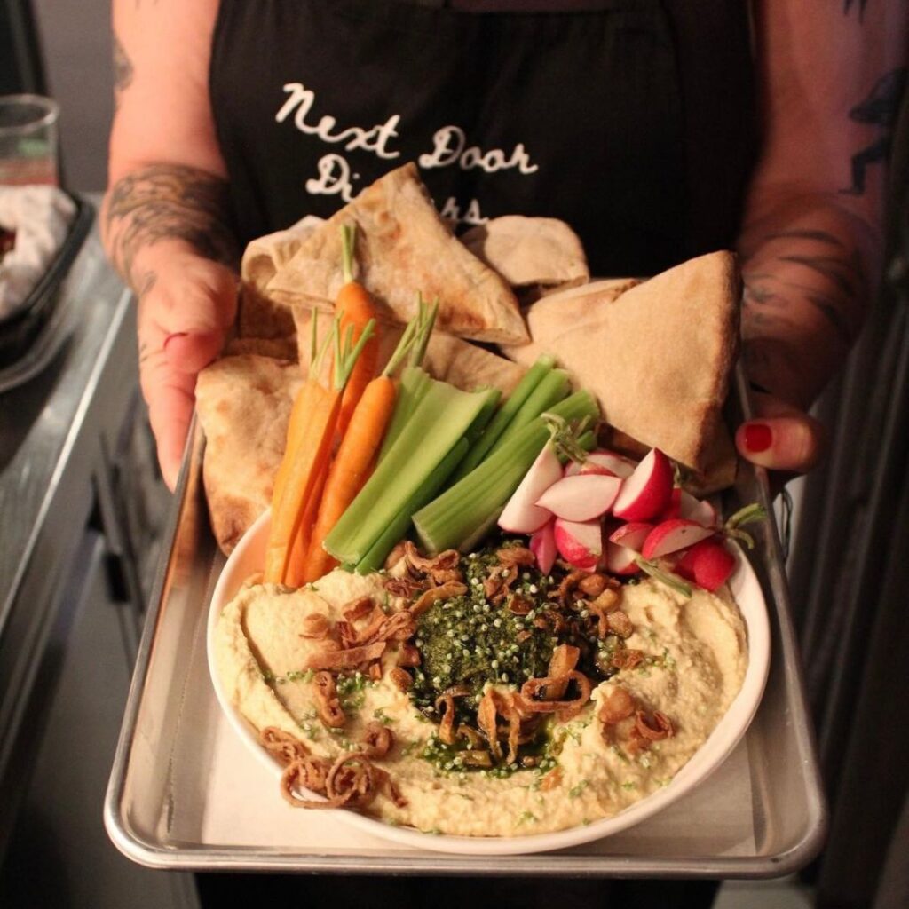 Pita bread and beautiful, vibrant local crudité add the perfect touch to the appetizer at the Next Door Dinners' June 18th event.