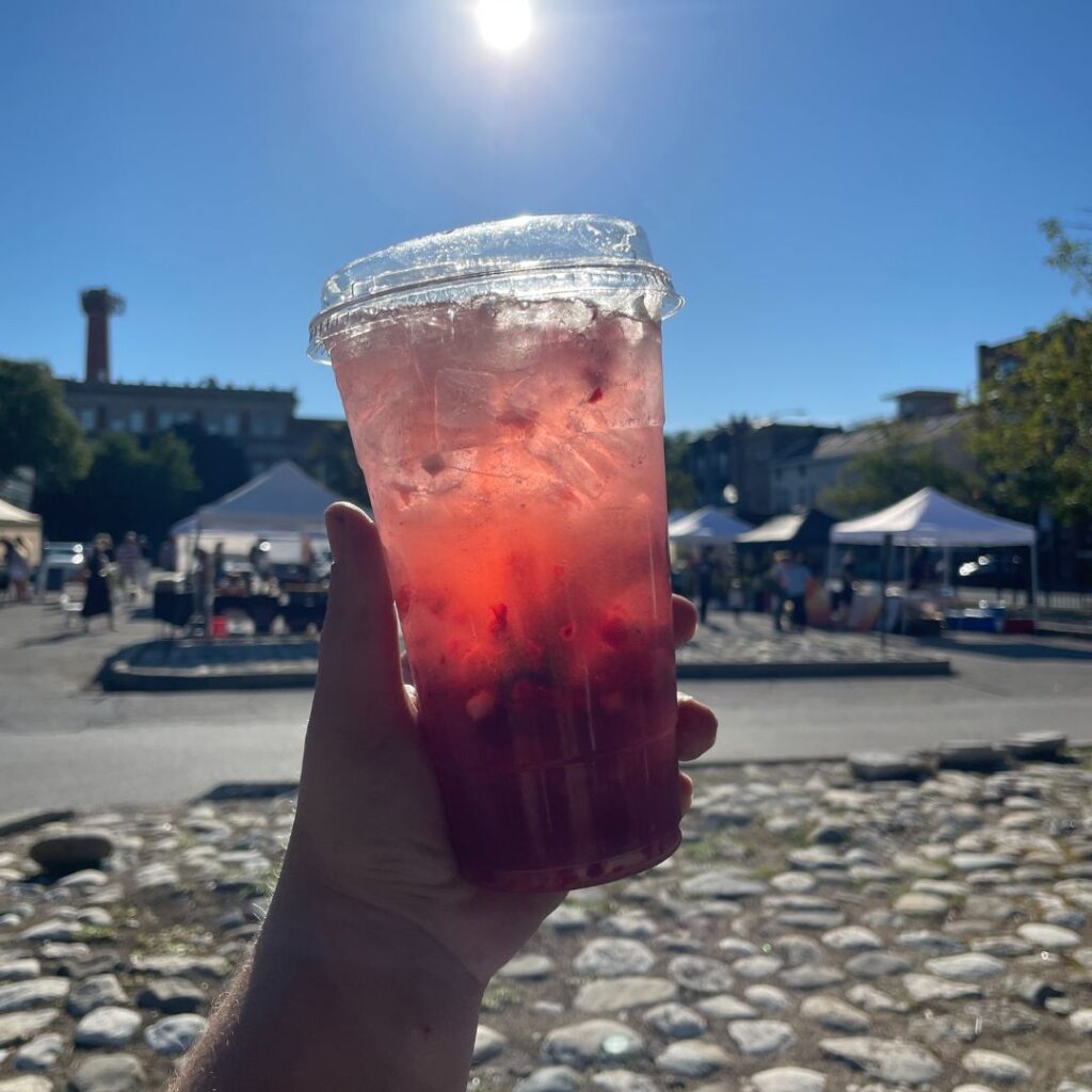 A Guayusa Refresher shining in the early fall sun in September at the Lincoln Park Farmers Market.