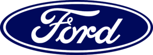 The iconic Ford logo with its white script on a blue oval background. This logo symbolizes Ford, a company mentioned in the blog post as one that has reduced its DEI efforts, potentially in response to external pressures, as it retreats from commitments to inclusivity and equity.