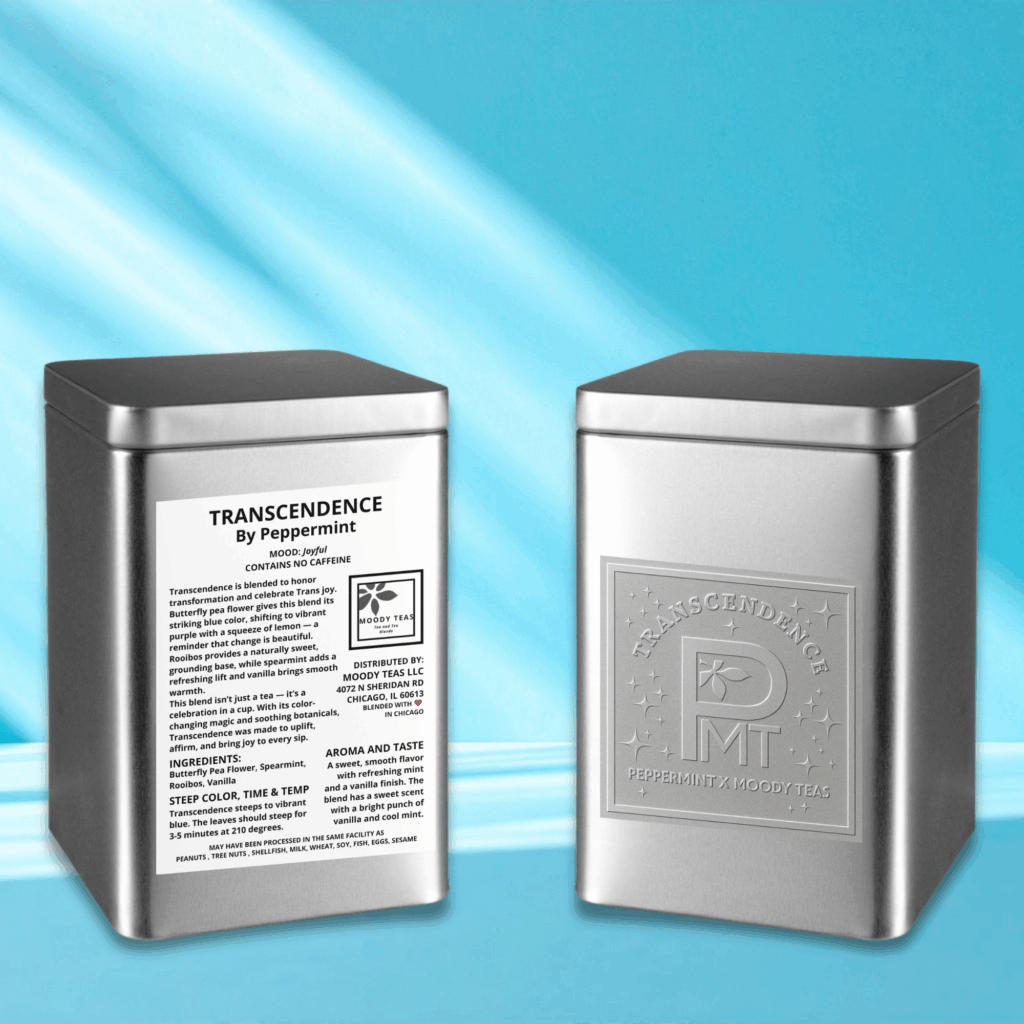 Two silver tins of Transcendence by Peppermint, a Moody Teas collaboration blend, displayed against a bright blue background. One tin shows the embossed Transcendence logo with stars, while the other displays the product label listing ingredients—rooibos, vanilla, butterfly pea flower, and spearmint—and describing the tea’s joyful, color-shifting nature.